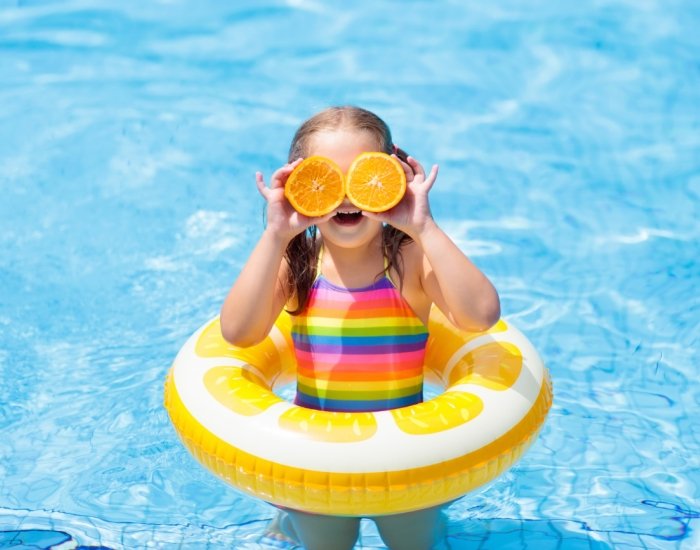 Child in a pool for a villa for young families