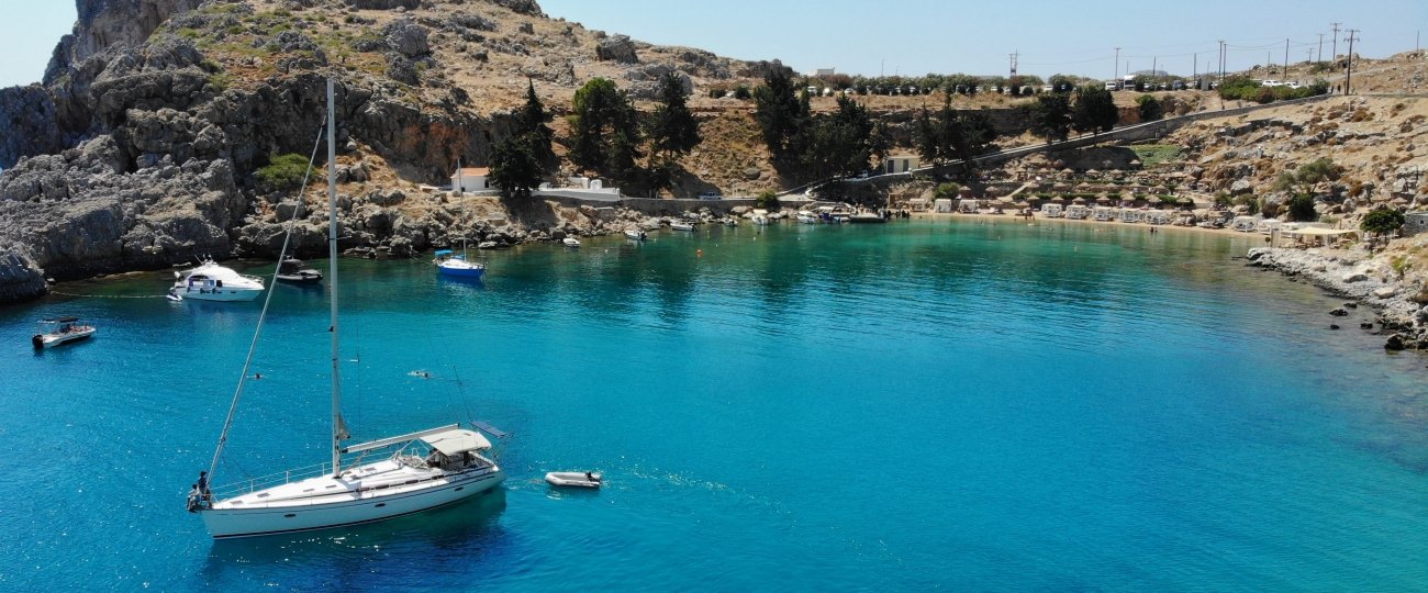 dimitris-kiriakakis-GqstaPBPBvw-unsplash.jpg Boat on St Pauls Bay, Rhodes, Greece