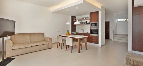 sr_living_room_and_kitchenette_premium_villas.jpg Holiday home in Albufeira villa booking