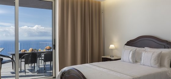 15_our_madeira_-_cliffscape_-_bedroom_master.jpg Holiday home in Portugal villa booking