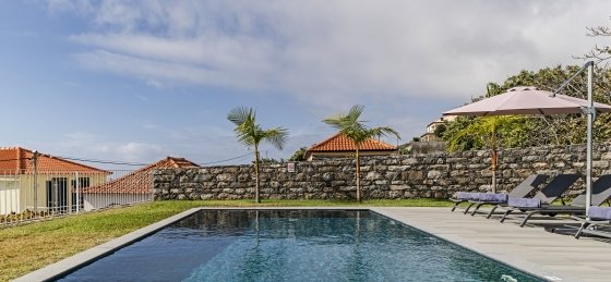3_-_our_madeira_-_calheta_heights_-_pool_and_chairs.jpg Holiday villas in Portugal